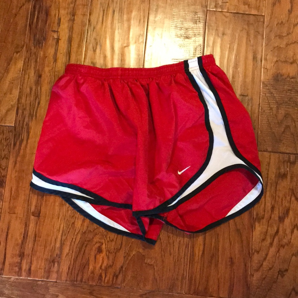 Red and black nike shorts medium